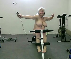 Solo mature woman having fun while dancing in the gym - Bohunka