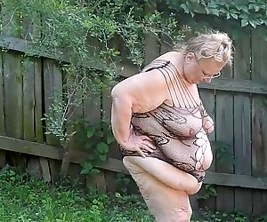outside showing off in garden