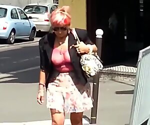 Sexy granny whith see thru top in public